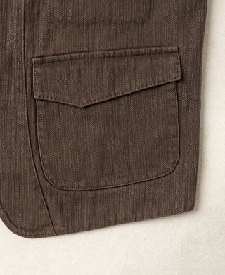 Brown herringbone waistcoat side patch pocket with flap and curved lower seam