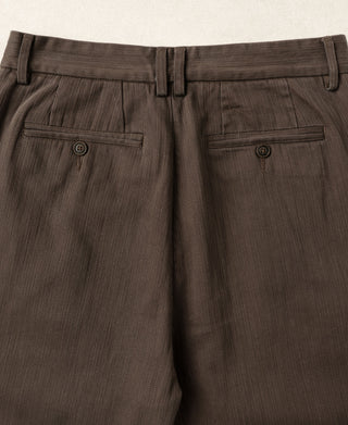 Brown trousers rear view with waist yoke and belt loops