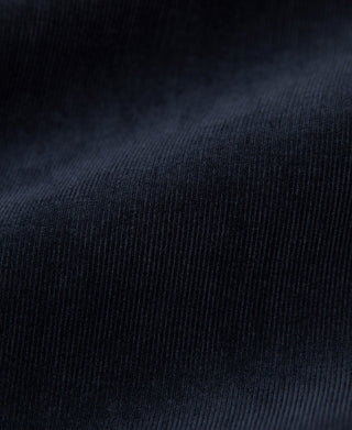 Indigo corduroy fabric texture close-up