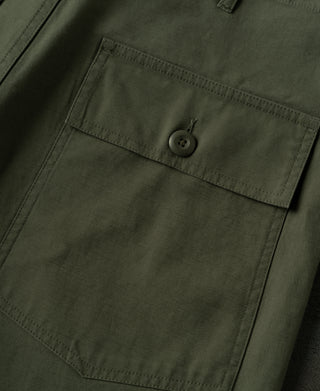 Olive cotton sateen fatigue pants with buttoned flap cargo pocket