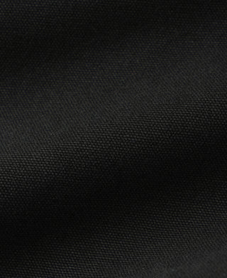 Black textured duck canvas fabric close-up