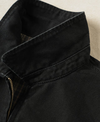 Black cossack jacket in duck canvas with zip front and structured stand collar
