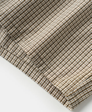 Close up view of the brown striped cotton fabric texture