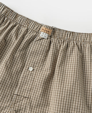 Close up view of the branded label and vintage inspired cotton fabric