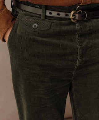 Dark green corduroy waistband with single button closure and belt loops