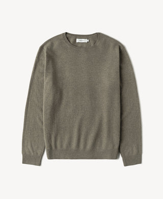 Merino wool crewneck sweater in gray-green, long sleeves, ribbed cuffs and hem.