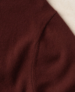 Jasper Red knit crewneck sweater with stitched shoulder seam and smooth fabric texture