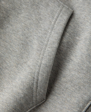 Detailed view of the kangaroo pocket edge and reinforced stitching