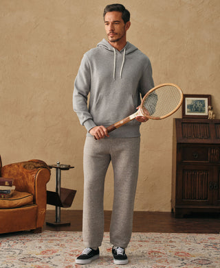 Man wearing the light gray heavyweight cotton hoodie with matching sweatpants