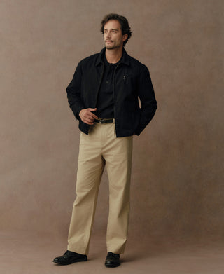 Black duck canvas cossack jacket with snap front, standing collar, chest pockets