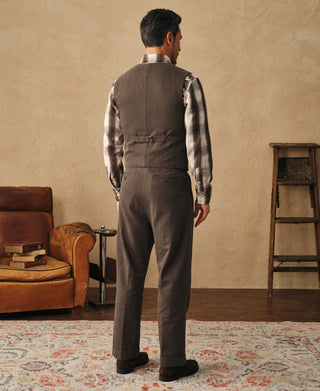 Brown herringbone double-pleated back view trousers with center pleat seams