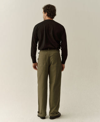 Black cotton long-sleeve henley shirt, back view
