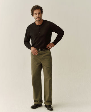 Black cotton henley shirt with long sleeves and front button placket