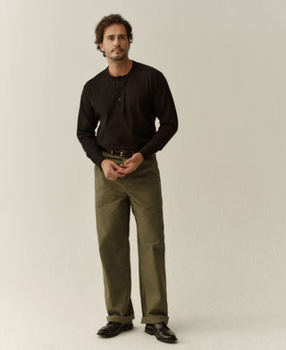 Black cotton henley shirt with long sleeves and button placket
