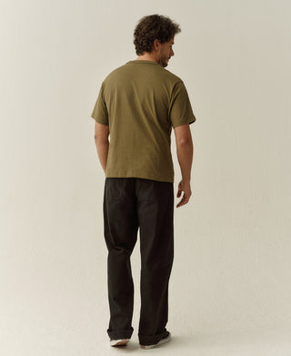 Olive boxy cotton T-shirt with short sleeves, shown from the back