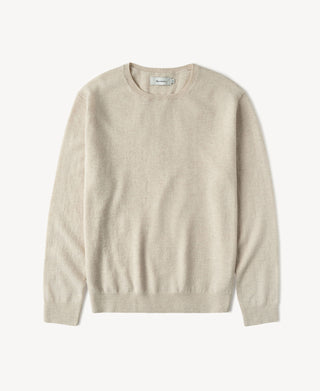 Apricot merino wool crewneck sweater with long sleeves and ribbed hem