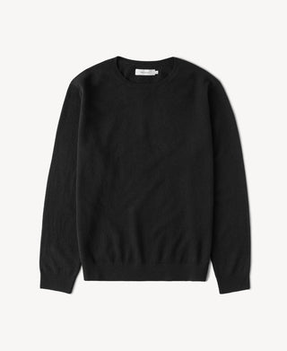 Black merino wool crewneck sweater with ribbed crew neck and cuffs.