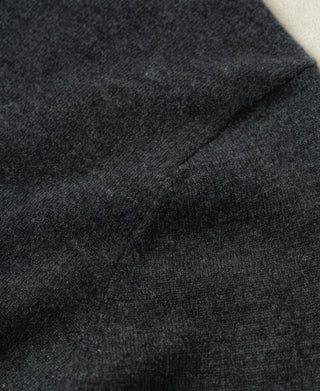 Heather gray merino wool knit fabric close-up with subtle speckle texture