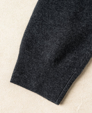 Heather gray sweater cuff with ribbed knit finish and sleeve knit texture