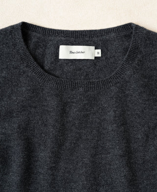 Heather gray crewneck merino wool sweater neckline and size label tag detail