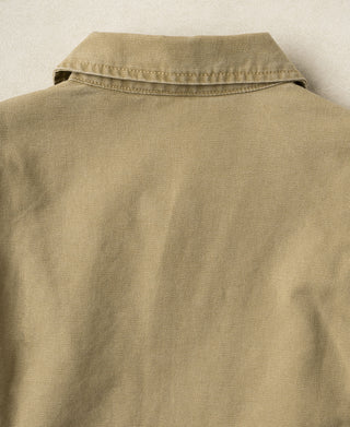 Washed khaki canvas cossack jacket with band collar, front yoke seam
