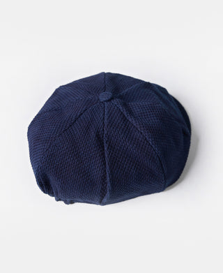 eight-panel crown of Indigo-Dyed Sashiko Newsboy Cap