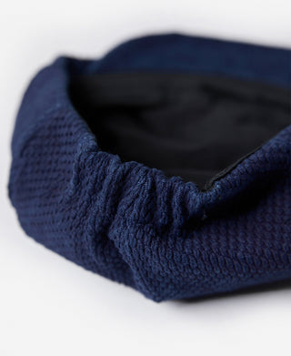 elastic strap closure of Indigo-Dyed Sashiko Newsboy Cap