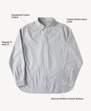 Light blue striped oxford button-down shirt with chest pocket, long sleeves.