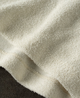 hem detail of Silk and Cotton-Blend Terry Cloth Polo Shirt