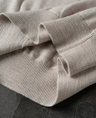 hem detail of Slub Cotton Long Sleeve Knit Polo