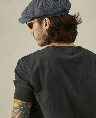 lifestyle shot of 1900s Slub Cotton Short-Sleeve Henley Shirt