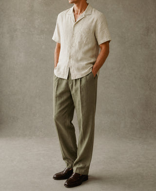 lifestyle shot of 1940s Double-Pleated Pure Hemp Pants in Olive