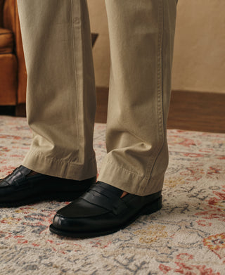 Khaki chino trousers front view with straight legs and ankle-length hem
