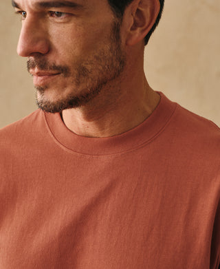 lifestyle shot of Regular Fit Heavyweight Tubular Jersey T-Shirt in Orange