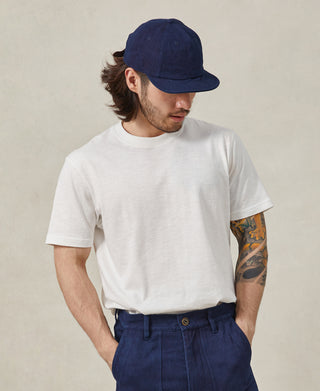 lifestyle shot of Indigo-Dyed Cotton-Linen Ball Cap
