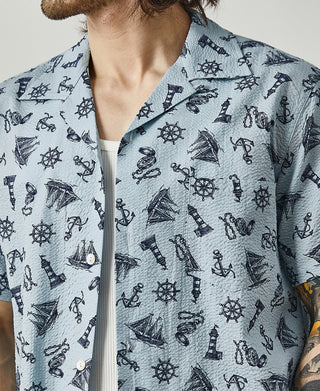 lifestyle shot of Nautical Printed Seersucker Short Sleeve Camp Shirt