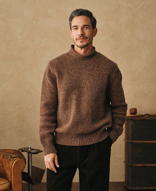 lifestyle shot of Roll Neck Pure Wool Fisherman Sweater