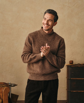 lifestyle shot of Roll Neck Pure Wool Fisherman Sweater
