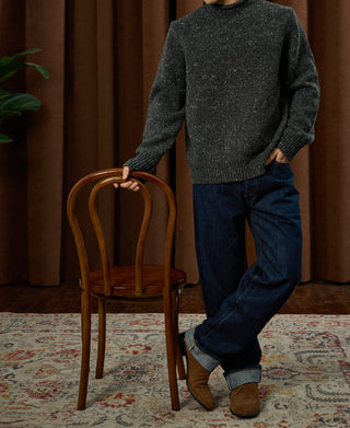 lifestyle shot of Roll Neck Pure Wool Fisherman Sweater