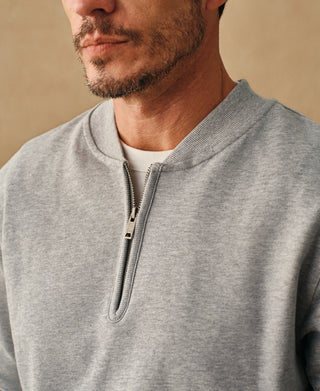 lifestyle shot of Track Quarter-Zip Baseball Sweatshirt