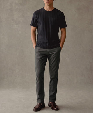 Men's heavyweight ribbed cotton pocket T-shirt, vintage black crew neck, worn by model.