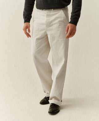 White deck pants front view with pleated waistband, belt loops, straight legs