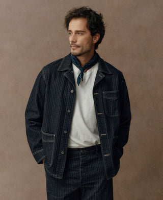 Indigo herringbone denim work jacket, button front and flap chest pockets