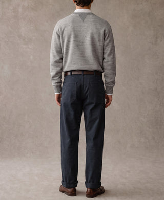 Navy herringbone deck pants with button fly and cuffed hems, back view.
