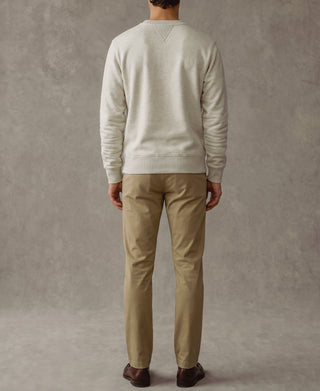 Light gray crewneck sweatshirt, back view, ribbed cuffs and hem