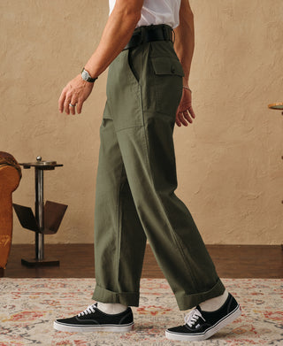 Olive fatigue pants back view with cargo pocket and belt loops