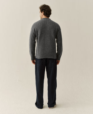 Gray pure wool Guernsey sweater with a mock neck, shown from the back