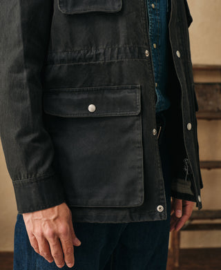 Black olive field jacket with flap front pocket and button cuffs