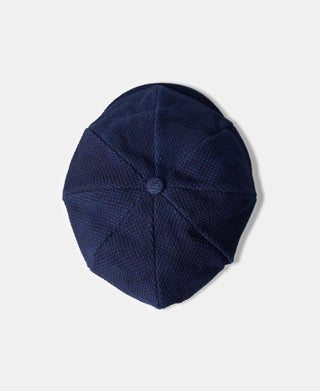 overhead view of Indigo-Dyed Sashiko Newsboy Cap
