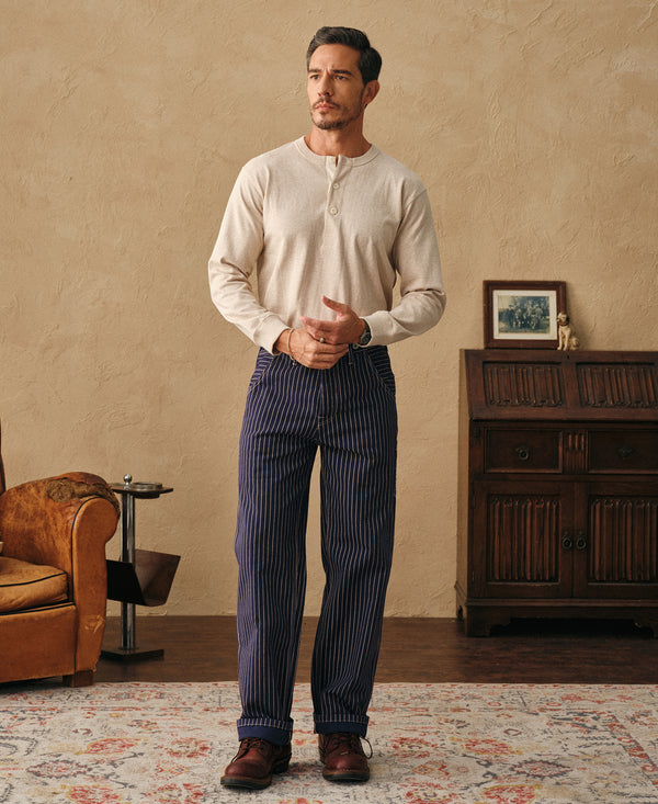Oatmeal cotton henley shirt with three-button placket and long sleeves